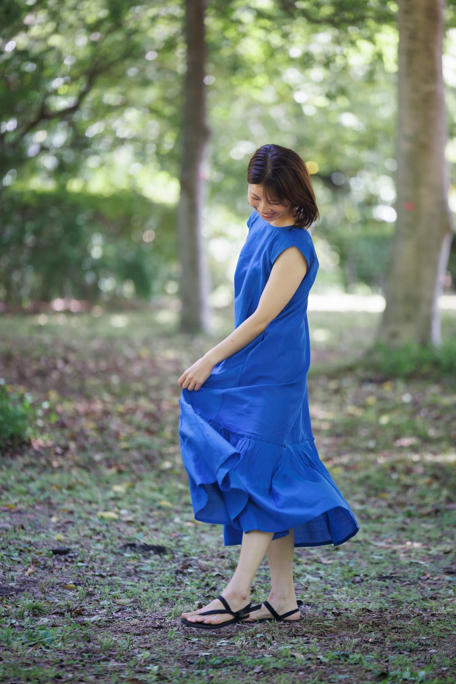 bright blue shift dress with tier hem and scoop back