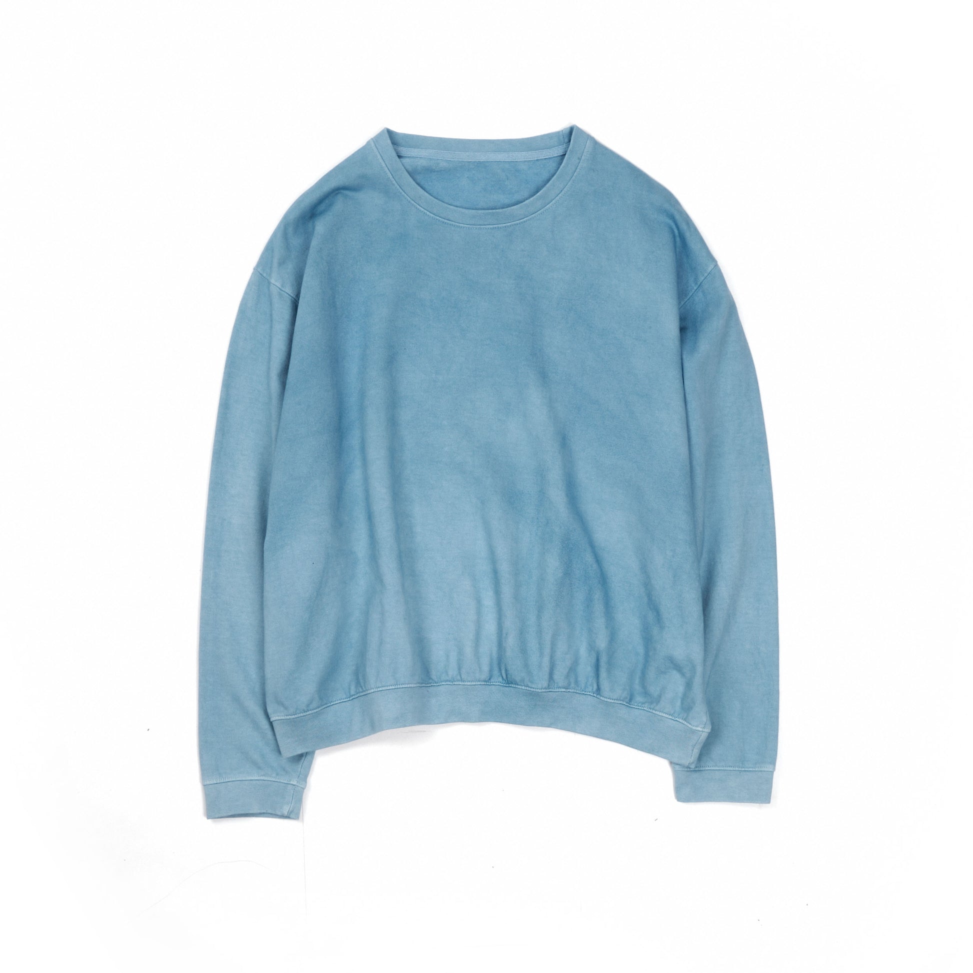 A light indigo dyed organic cotton crew neck