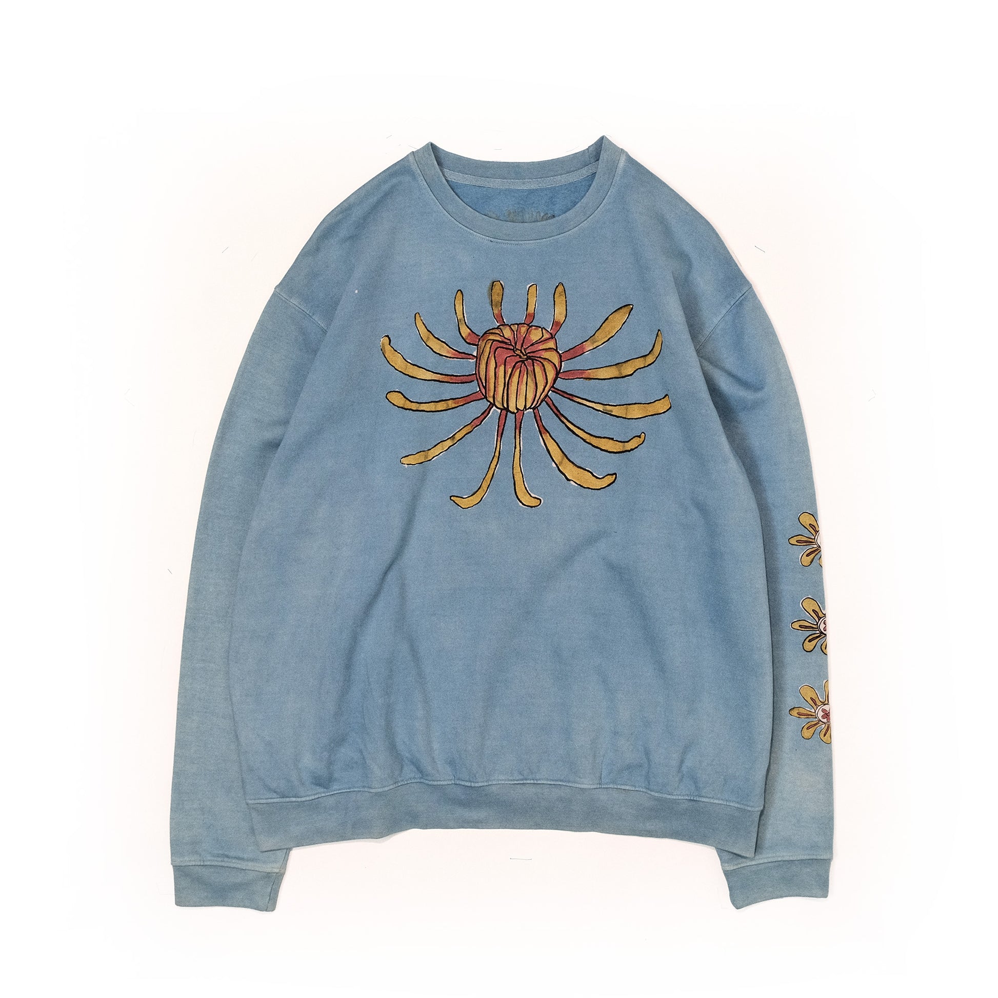 Organic cotton crew neck dyed with natural indigo and handpainted with other natural colours